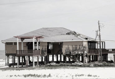 Wind damage - spray foam can help prevent uplift to Torrance roofs